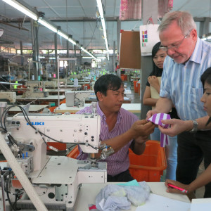 Going through the process of cutting Knit Fabric at Thiri Sandar